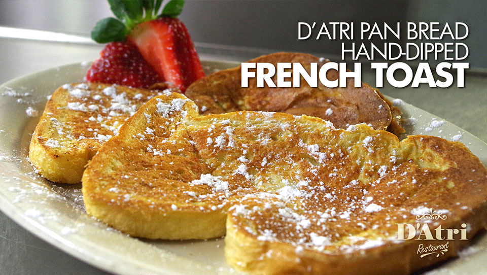 A breakfast favorite! Hand dipped French toast made ith home made Bread!